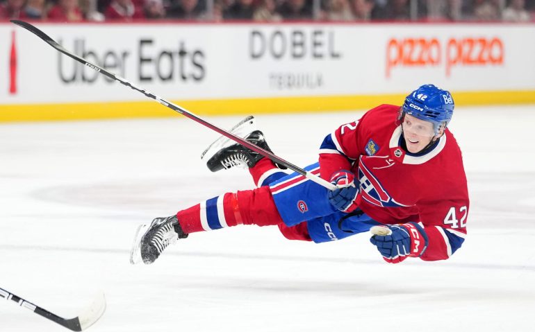 Dec 16, 2025; Montreal, Quebec, CAN; Montreal Canadians defenseman Adam Engstrom (42) takes a shot on net during the first period of the game against the Philadelphia Flyers at the Bell Centre. Mandatory Credit: Eric Bolte-Imagn Images