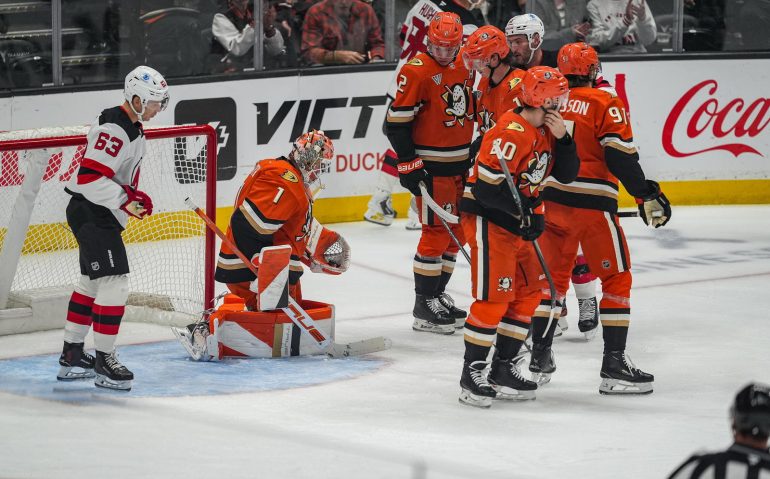 Nov 2, 2025; Anaheim, California, USA; Anaheim Ducks goaltender Lukas Dostal (1) with a save against the New Jersey Devils during the second period at Honda Center. Mandatory Credit: Corinne Votaw-Imagn Images