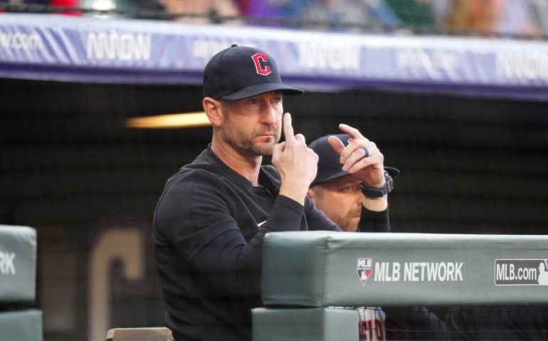 May 28, 2024; Denver, Colorado, USA; Cleveland Guardians bench coach Craig Albernaz (55) calls in a play in the first inning against the Colorado Rockies at Coors Field. Mandatory Credit: Ron Chenoy-USA TODAY Sports