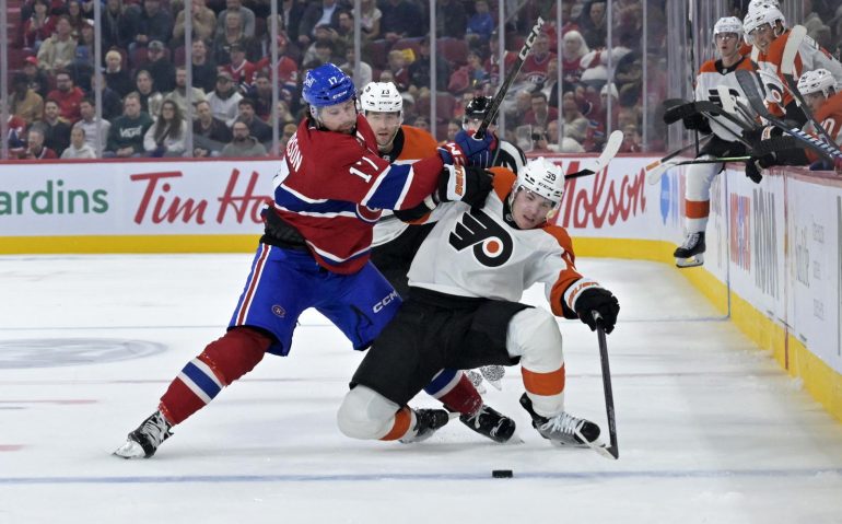 Sep 23, 2024; Montreal, Quebec, CAN; Montreal Canadiens forward Josh Anderson (17) checks Philadelphia Flyers defenseman Oliver Bonk (59) during the third period at the Bell Centre. Mandatory Credit: Eric Bolte-Imagn Images