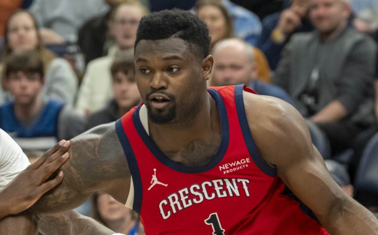 Mar 19, 2025; Minneapolis, Minnesota, USA; New Orleans Pelicans forward Zion Williamson (1) drives to the basket past Minnesota Timberwolves center Naz Reid (11) in the second half at Target Center. Mandatory Credit: Jesse Johnson-Imagn Images