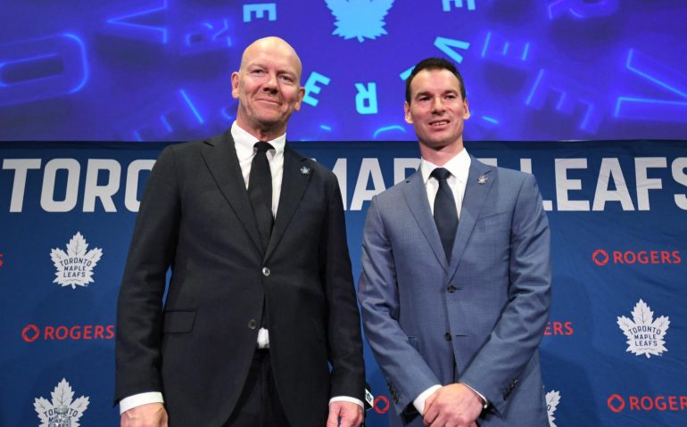 May 4, 2026; Toronto, Ontario, CANADA;  Toronto Maple Leafs new senior executive advisor Mats Sundin (l) and general manager John Chayka pose for picture after an introductory news conference at Real Sports Bar and Grill. Mandatory Credit: Dan Hamilton-Imagn Images