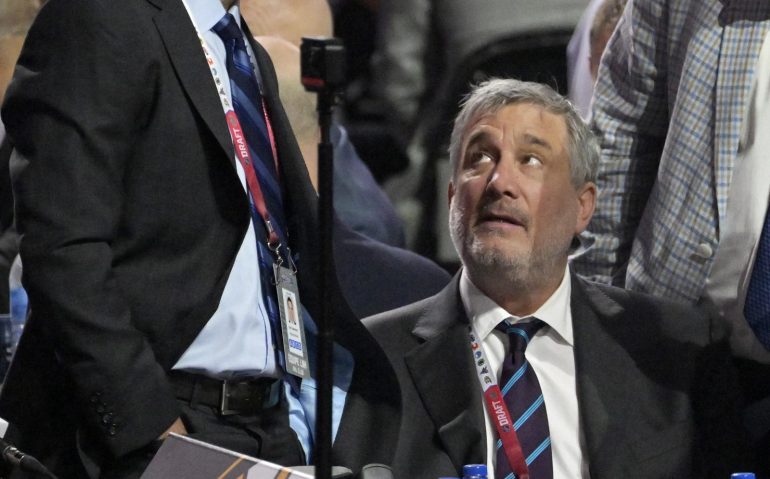 Jul 8, 2022; Montreal, Quebec, CANADA; Boston Bruins general manager Don Sweeney (left) and president Cam Neely discuss during the second round of the 2022 NHL Draft at the Bell Centre. Mandatory Credit: Eric Bolte-USA TODAY Sports