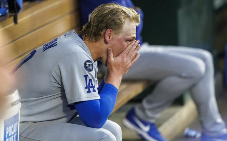 ANAHEIM, CA -AUGUST 12, 2025: Los Angeles Dodgers pitcher Emmet Sheehan (80) sits in the dugout after giving up the go-ahead solo homer to Angeles outfielder Taylor Ward in the third inning at Angel Stadium on August 12, 2025 in Anaheim, California.(Gina Ferazzi / Los Angeles Times)