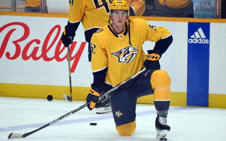 Mar 25, 2023; Nashville, Tennessee, USA; Nashville Predators defenseman Cal Foote (52) stretches before the game against the Seattle Kraken at Bridgestone Arena. Mandatory Credit: Christopher Hanewinckel-USA TODAY Sports
