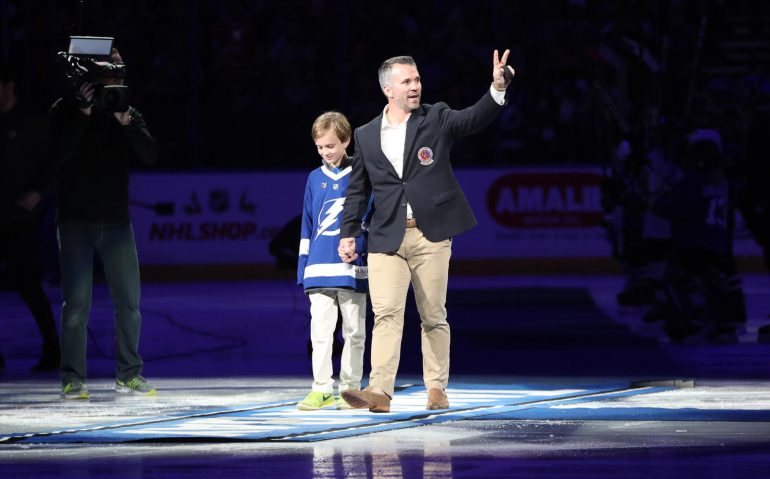 Nov 21, 2018; Tampa, FL, USA; Tampa Bay Lightning celebrate the Hall-of-Fame induction of Martin St. Louis prior to the game against the Florida Panthers at Amalie Arena. Mandatory Credit: Kim Klement-USA TODAY Sports