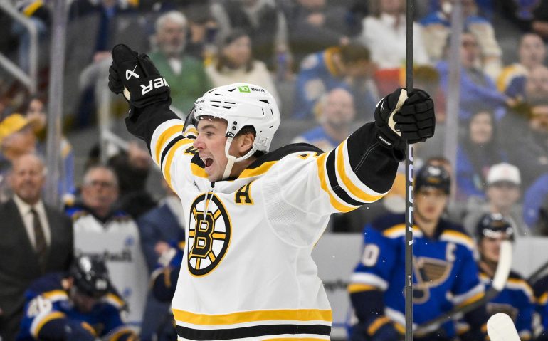 Nov 12, 2024; St. Louis, Missouri, USA;  Boston Bruins defenseman Charlie McAvoy (73) reacts after scoring the game tying goal against the St. Louis Blues during the third period at Enterprise Center. Mandatory Credit: Jeff Curry-Imagn Images