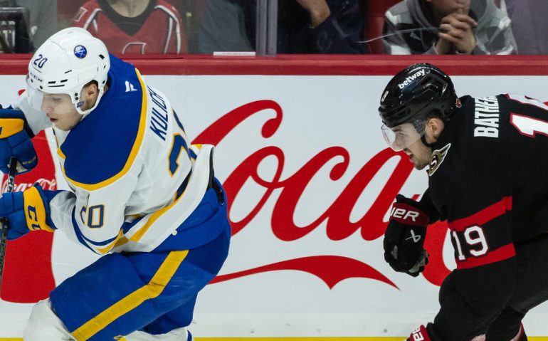 Apr 1, 2025; Ottawa, Ontario, CAN; Buffalo Sabres center Jiri Kulich (20) skates with the puck in front of Ottawa Senators right wing Drake Batherson (19) in the third period at the Canadian Tire Centre. Mandatory Credit: Marc DesRosiers-Imagn Images