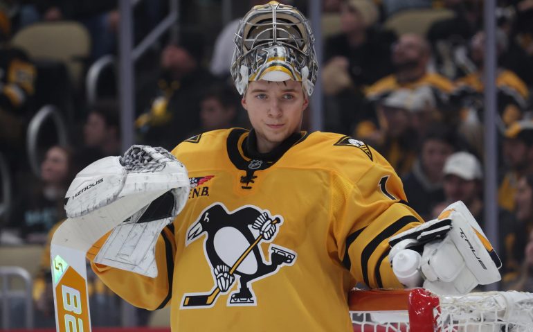Nov 22, 2025; Pittsburgh, Pennsylvania, USA;  Pittsburgh Penguins goaltender Sergei Murashov (1) looks on during a second period time-out against the Seattle Kraken at PPG Paints Arena. Mandatory Credit: Charles LeClaire-Imagn Images
